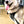 photo of a large Siberian Husky on a so-cal beach shore pier wearing a black Duo Direct no-pull escape-proof dog harness made in the USA with a lifetime warranty